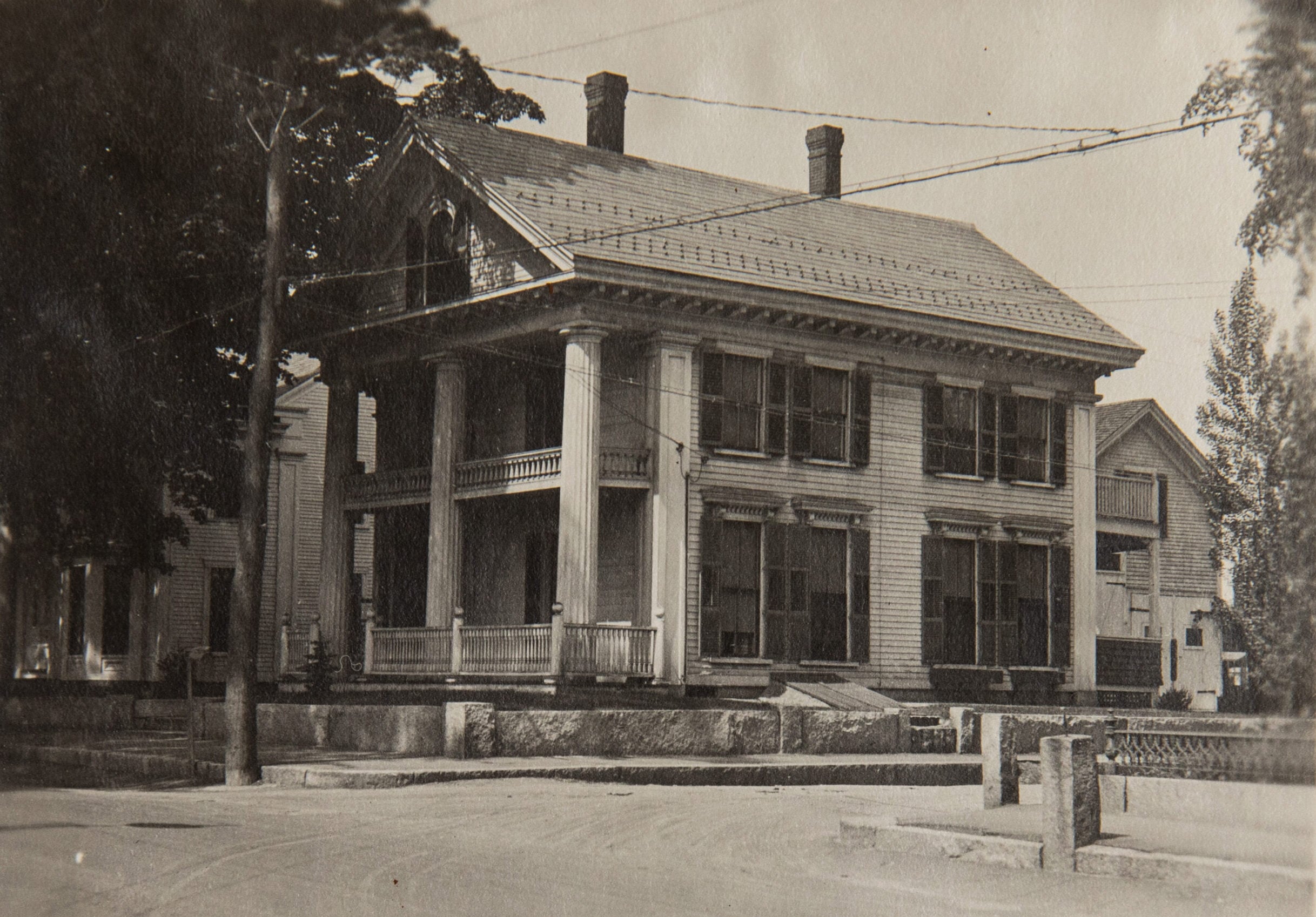 Black and white photo of the Mary Baker Eddy historic house in Concord.