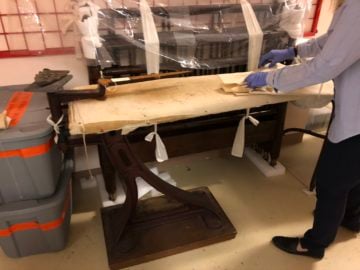 Longyear’s collections team discovers an artifact under wraps