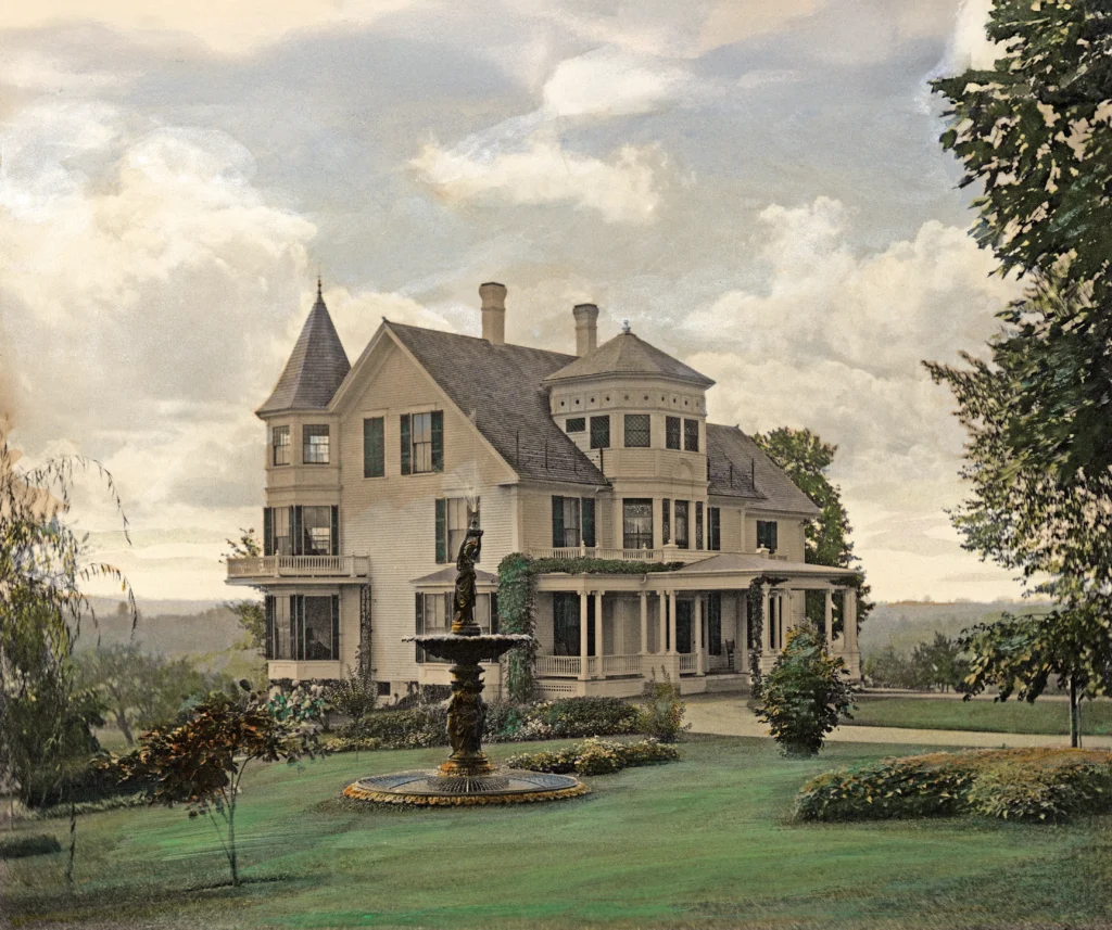 A hand-tinted photograph of Mrs. Eddy’s Pleasant View home in Concord, New Hampshire, with the fountain in the foreground. Longyear Museum Collection.