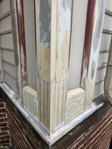 Epoxy applied to end wood grain of house trim; wood rot repair at Mary Baker Eddy Historic House Lynn, Massachusetts