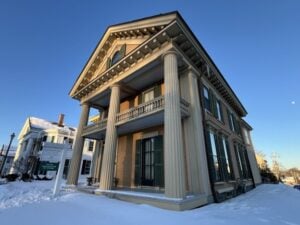 Icicle on snow-covered Mary Baker Eddy historic house in Lynn, Massachusetts